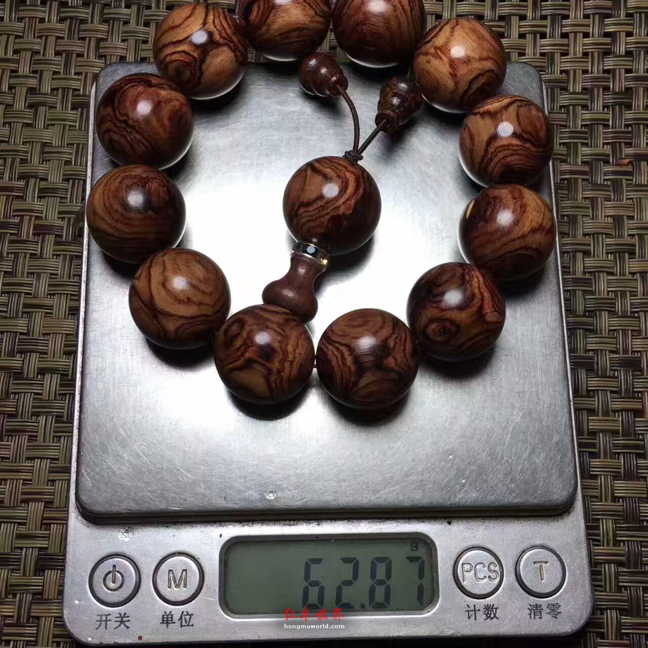 特顶级紫檀柳2.0对眼手串 花梨底色对眼整齐-4